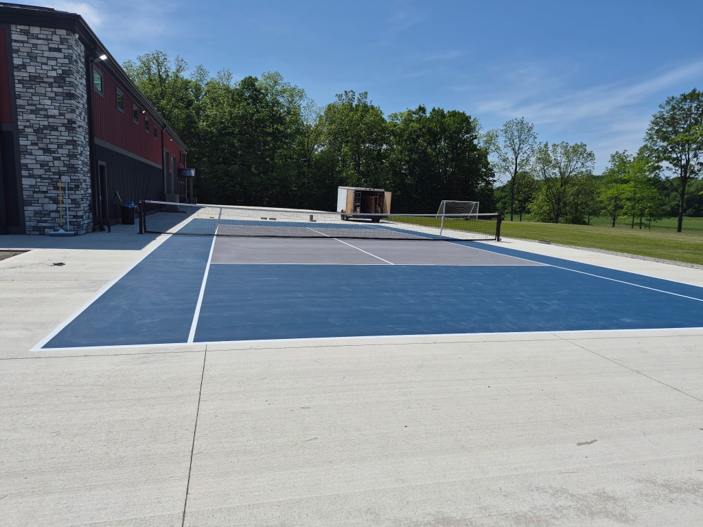 Custom epoxy floor coating on outdoor court