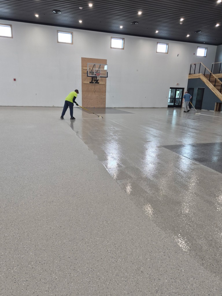 Decorative flake epoxy floor installation in progress